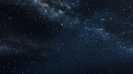 Fototapeta premium A dark, starry sky with a band of the Milky Way galaxy.