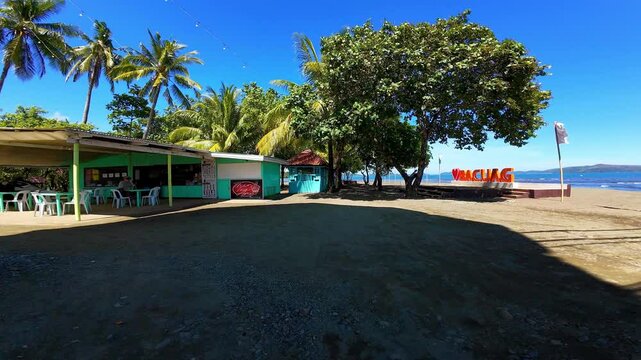Experience an aerial journey to Bacuag Adventure Beach in Surigao Del Norte, Mindanao. This tropical paradise features a long hanging bridge, island with zip lines and zip bikes, vibrant coral reefs, 
