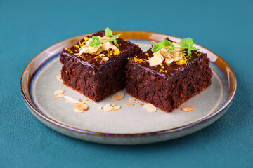 Orange Chocolate Brownie. Delicious homemade dark chocolate orange dessert for Christmas. Choco cake and orange slices.