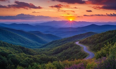 Winding Asphalt Road Through Lush Mountain Valley at Sunset
