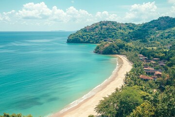 Idyllic tropical clear sea and green island panorama with sand beach and calm turquoise water.