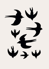 Vector Set Silhouette of a flock of flying birds
