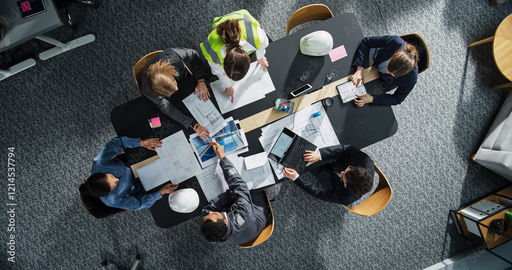 Aufkleber Top Down View of Diverse Team of Business Professionals and Engineers Working Together on Architectural Plans in a Corporate Office. Focused Colleagues Using Laptop, Tablet, Blueprints And Documents