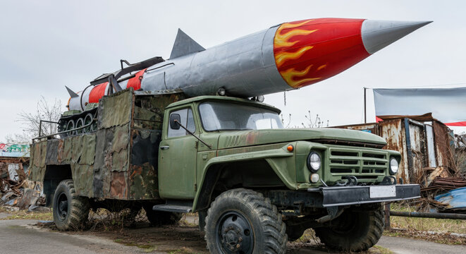 Fictional rusty Russian Sarmatmobile military truck with a dummy missile, showcasing fake military technology and power
