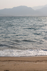 Wave detail in a beach at morning