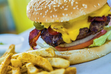classic bacon cheeseburger served with French fries