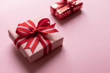 Valentine's day celebration gift boxes on the pink background. Copy space