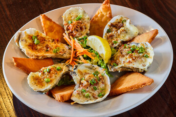 charbroiled oysters served with toast points
