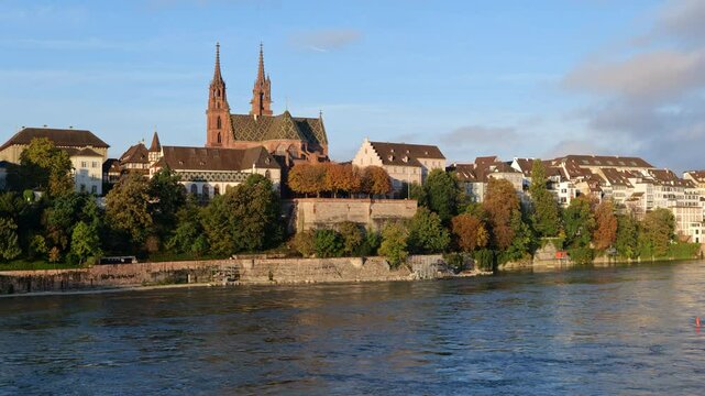 City skyline of Basel in Switzerland. The Old Town at River Rhine with Basel Minster (Basler Munster) Cathedral.
