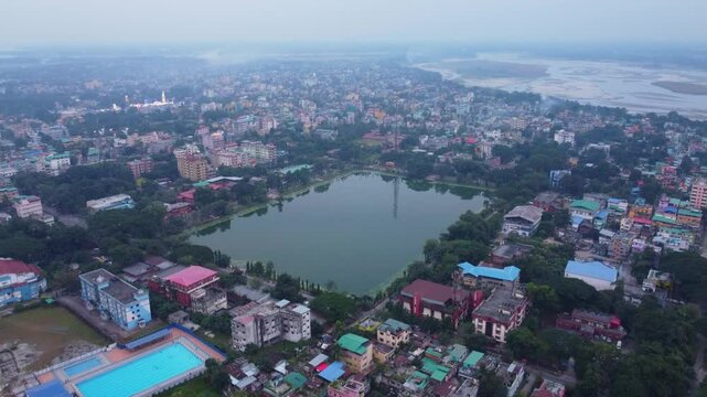 Cooch Behar city landscape on the bank of River Torsa on the foothills of Eastern Himalayas, West Bengal, Aerial shot