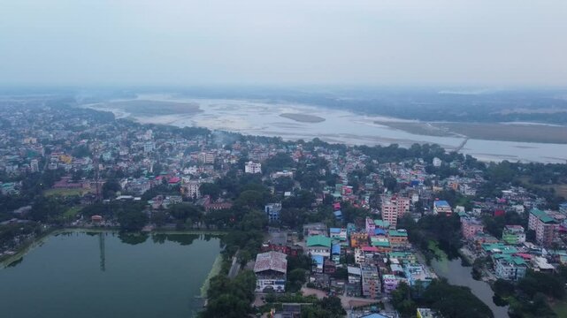 Drone view of Cooch Behar city landscape on the bank of River Torsa on the foothills of Eastern Himalayas, West Bengal