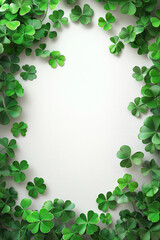 Fototapeta premium Clover leaves on a white background, beautiful frame, background photo. Advertising banner, good luck charm for St. Patrick's Day. Bright and festive St. Patrick's Day.