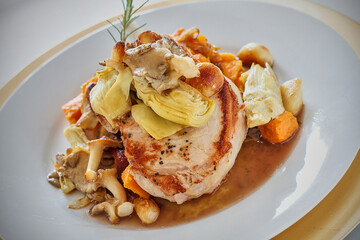 pan seared pork chop with sautéed mushrooms and sweet potatoes