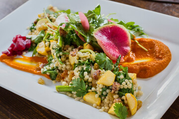 pearl couscous salad with a squash puree