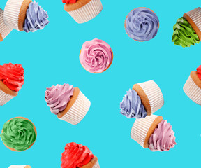 Pattern of cupcakes with bright cream on light blue background