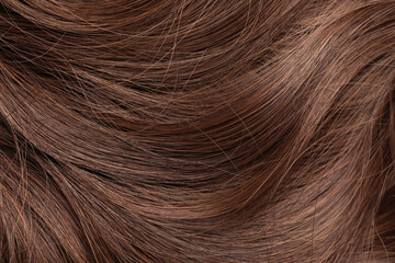 Beautiful hair in mocha mousse shade, closeup. Trendy color of 2025 year