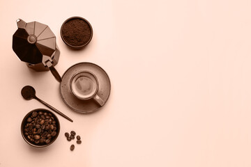 Flat lay composition with coffee in cup and roasted beans, toned in mocha mousse shade. Trendy color of 2025 year