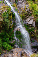 Obraz premium Marsyangdi river and waterfall in Himalaya mountains at sunny day. Annapurna Circuit Trek. Hiking trekking concept. Beautiful stream. Water in motion. Annapurna Conservation Area, Nepal