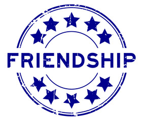 Grunge blue friendship word with star icon round rubber seal stamp on white background