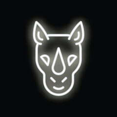 Neon sign of a smiling rhino head glowing white against a black background