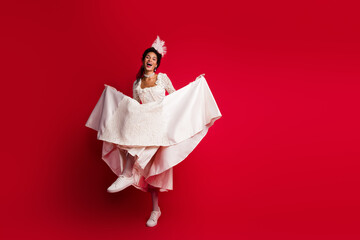 Photo of countess lady touch dress wearing antique style clothes dancing isolated red color...