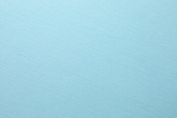 Blue paper background, abstract colored background, top view and flat lay