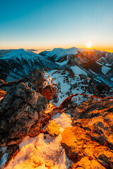 Naklejka premium Winter hiking to Velky Rozsutec in Mala Fatra National park is full of beautiful views. Sunset in Slovakia mountains. Slovakia landscape