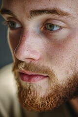 Obraz premium A close up shot of a man with a long beard, suitable for use in portraits or illustrations