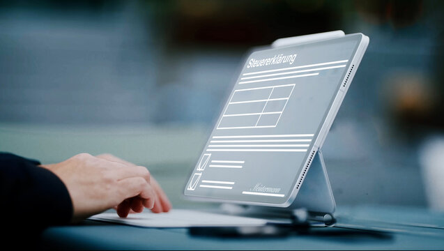 fiktives digitales Formular f&uuml;r die Steuererkl&auml;rung, im Hintergrund eine Person die an einem Tablet arbeitet, Steuern, Einkommen, Umsatz, E-Government, App, Finanzen, Finanzbeh&ouml;rde