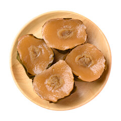 Sticky rice cake (Nian Gao), Chinese New Year cake on wooden plate, Top view