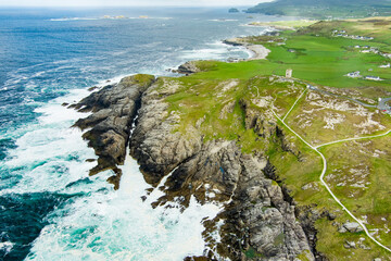 Rough and rocky shore at Malin Head, Ireland's northernmost point, Wild Atlantic Way, spectacular coastal route. Numerous Discovery Points. Co. Donegal