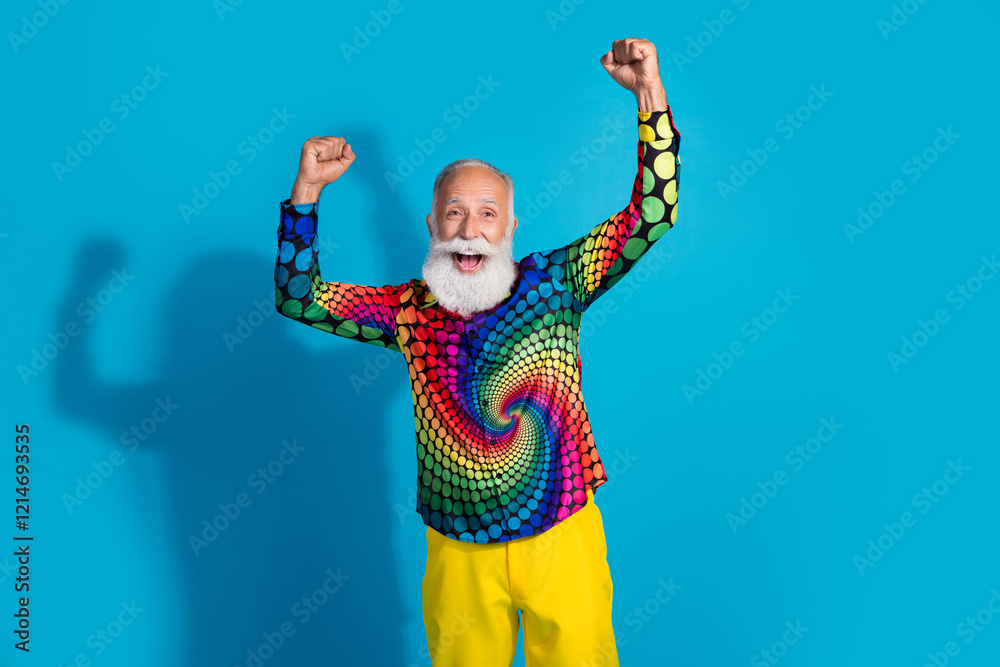 Canvas Prints Photo of eccentric funky aged man raise fists wear shirt isolated on blue color background