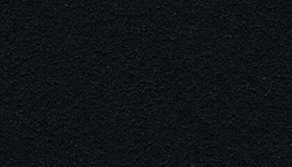 Black textured background with rough surface perfect for various design projects