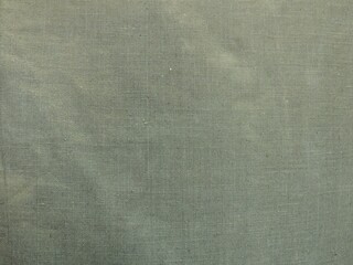 canvas fabric close up as rough grey green textile background, awning fabric macro view full frame as clothing texture, graphic fabric resource with empty copy space
