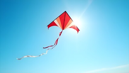 Dynamic capture of a kite soaring against a bright blue sky