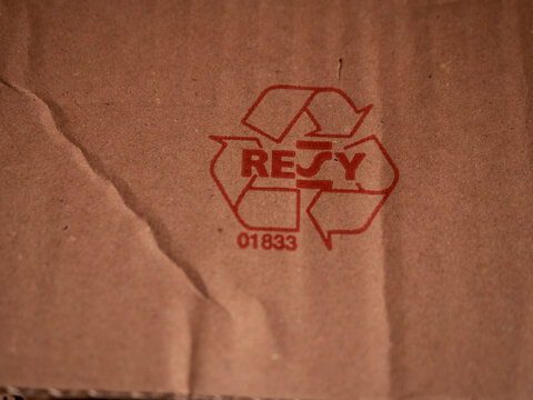Red carton RESY recyclable sign. Emballage Certificat. Signage on product cardboard box. Environment protection. Recycled material sign. Express goods delivery. Remote trading. Courier post services