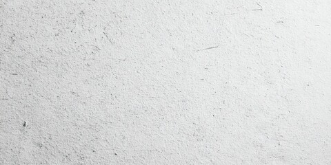 A minimalistic, textured white surface, conveying a sense of simplicity and neutrality.