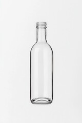 Fototapeta premium A clear, empty glass bottle stands upright against a plain background, showcasing its sleek design and smooth contours, perfect for packaging beverages.