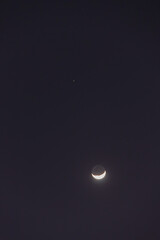 Earthshine is a soft, faint glow on the dark side of the moon. Earthshine occurs when sunlight reflects off the Earth's surface and illuminates the unlit portion of the Moon's surface.