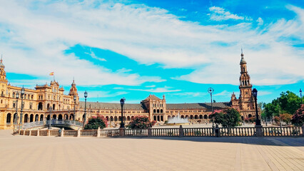 South wing of the plaza with palaces, balustrades, the south tower, and the fountain in the center....