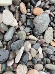 Large stones on the beach near the sea