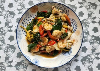 Spicy Seafood Stir Fry with Thai Herbs and Vegetables