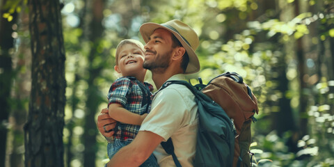 Man with child walking in the summer forest. Father and son family trip.