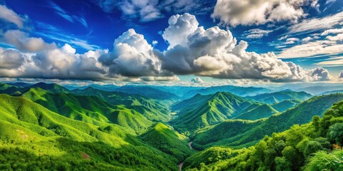 Obraz premium Green mountains rise majestically under a boundless blue sky, a picturesque cloudscape completing the World Environment Day scene.