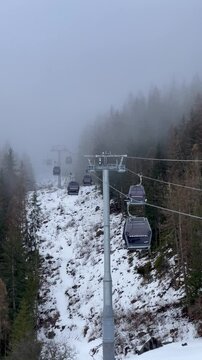 Ski lift in Courchevel ski resort going up from Le Praz to 1850