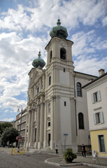 famous old church in gorizia italy (beautiful historic buildings in town square piazza) dome blue sky clouds history italian europe european
