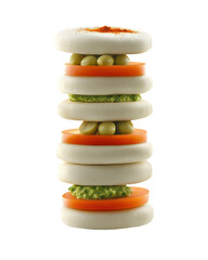 Gourmet Stack: A stunning culinary creation with a sophisticated presentation of  perfectly layered  tomatoes, peas, and a creamy pesto. An artistic symphony of vibrant colors and textures.