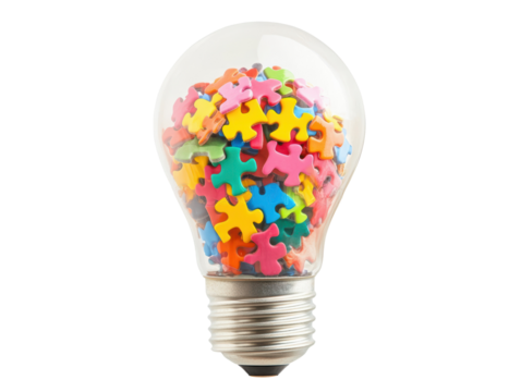 Isolated Lightbulb Filled with Puzzle Pieces
