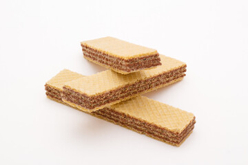 Chocolate flavored wafers on white