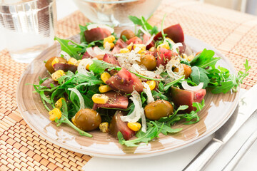 Fresh vegetarian healthy vegetable salad with arugula